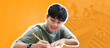 Student studying and writing